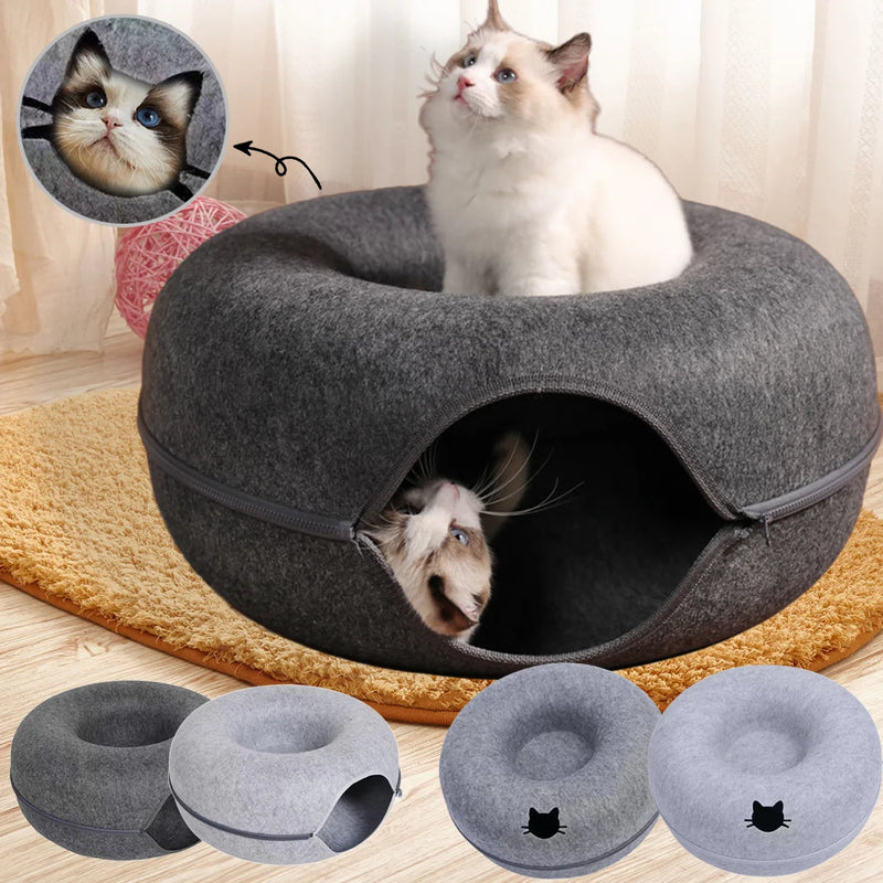Lit tunnel donut en feutre avec un chat