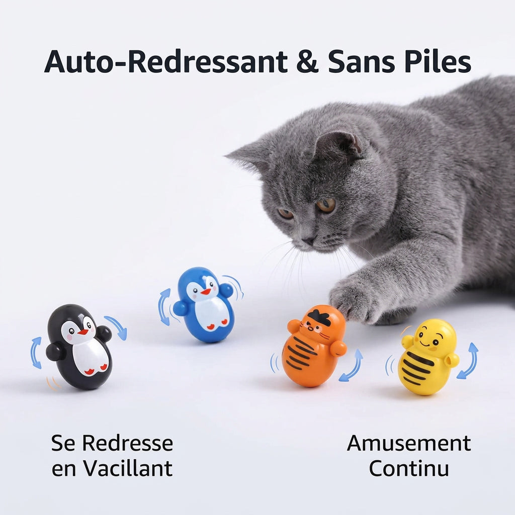 Chat qui joue avec les culbutos roulants